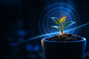 Young plant sprouting from soil in a pot with glowing light and blue circular digital effects in the background.